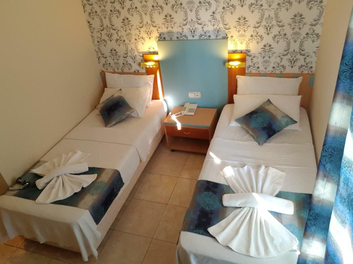 Uslan Hotel Кушадасы Экстерьер фото