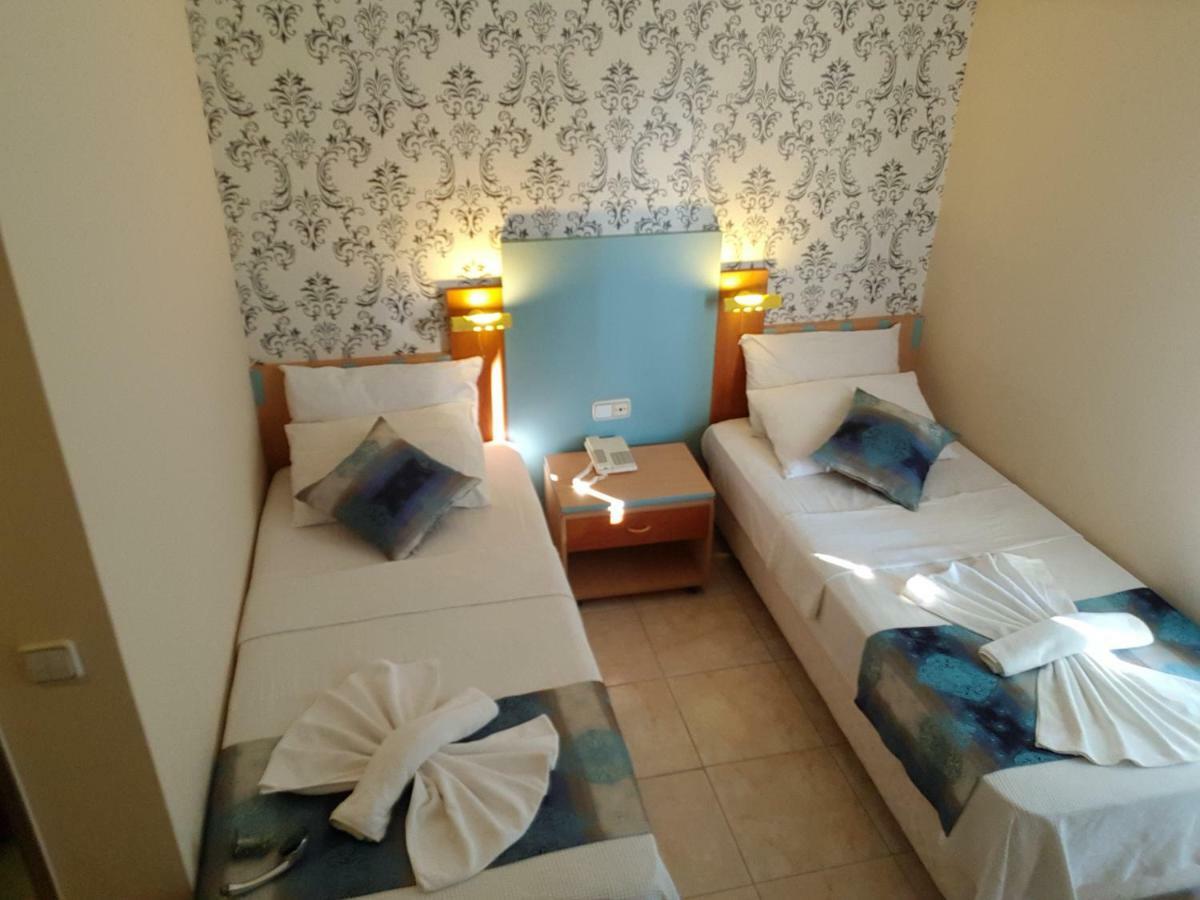 Uslan Hotel Кушадасы Экстерьер фото